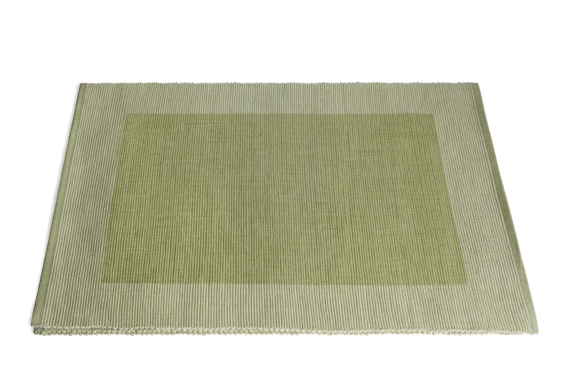 Luxury Green Placemats made from 100% organic cotton, showcasing a premium quality weave, perfect for elegant dining settings.