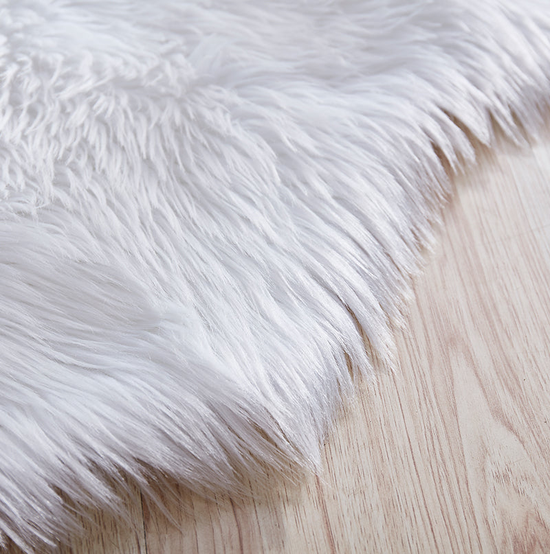 Luxury White Faux Fur Decorative Rug, hand tufted, soft acrylic material, 28" x 39" size, perfect for stylish home decor.