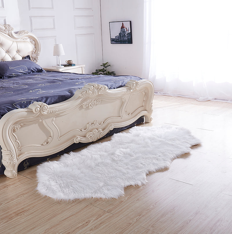 Luxury White Faux Fur Decorative Rug measuring 32 inches by 71 inches, showcasing a plush and soft texture, ideal for enhancing home decor.