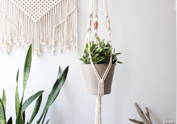 A beautifully handcrafted Copper Macrame Plant Hanger made from 100% cotton rope, showcasing a stylish design with copper accents, perfect for indoor plants.