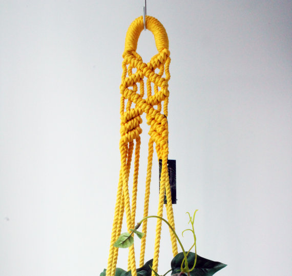 Hand Dyed Macrame Plant Hanger in yellow and orange, showcasing a stylish design made from 100% cotton rope, perfect for indoor and outdoor plants.