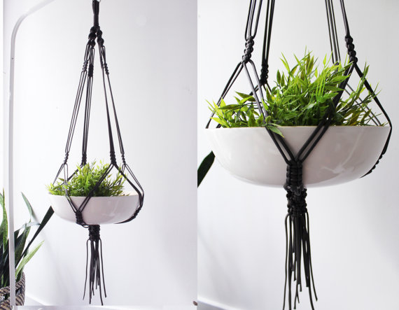 Handmade macrame plant hanger made of durable nylon cord, showcasing a beautiful design with intricate knots, perfect for displaying various pot sizes.