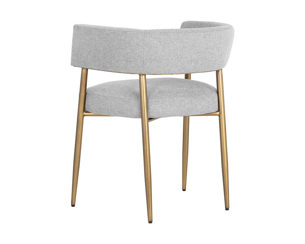 Maestro Dining Armchair in Belfast Heather Grey with antique brass legs, showcasing a contemporary design and curved frame.