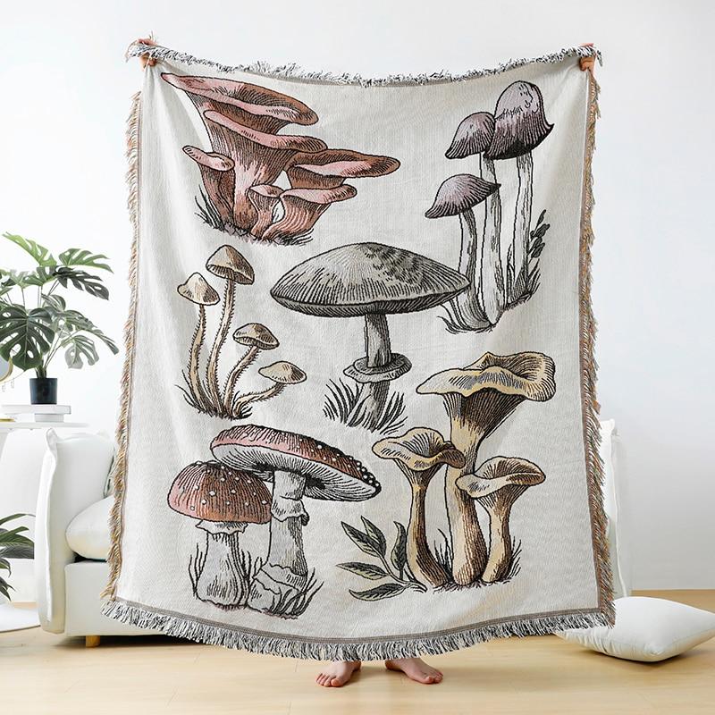 A cozy handmade Magic Mushroom Throw blanket featuring a whimsical mushroom design, perfect for warmth and home decor.