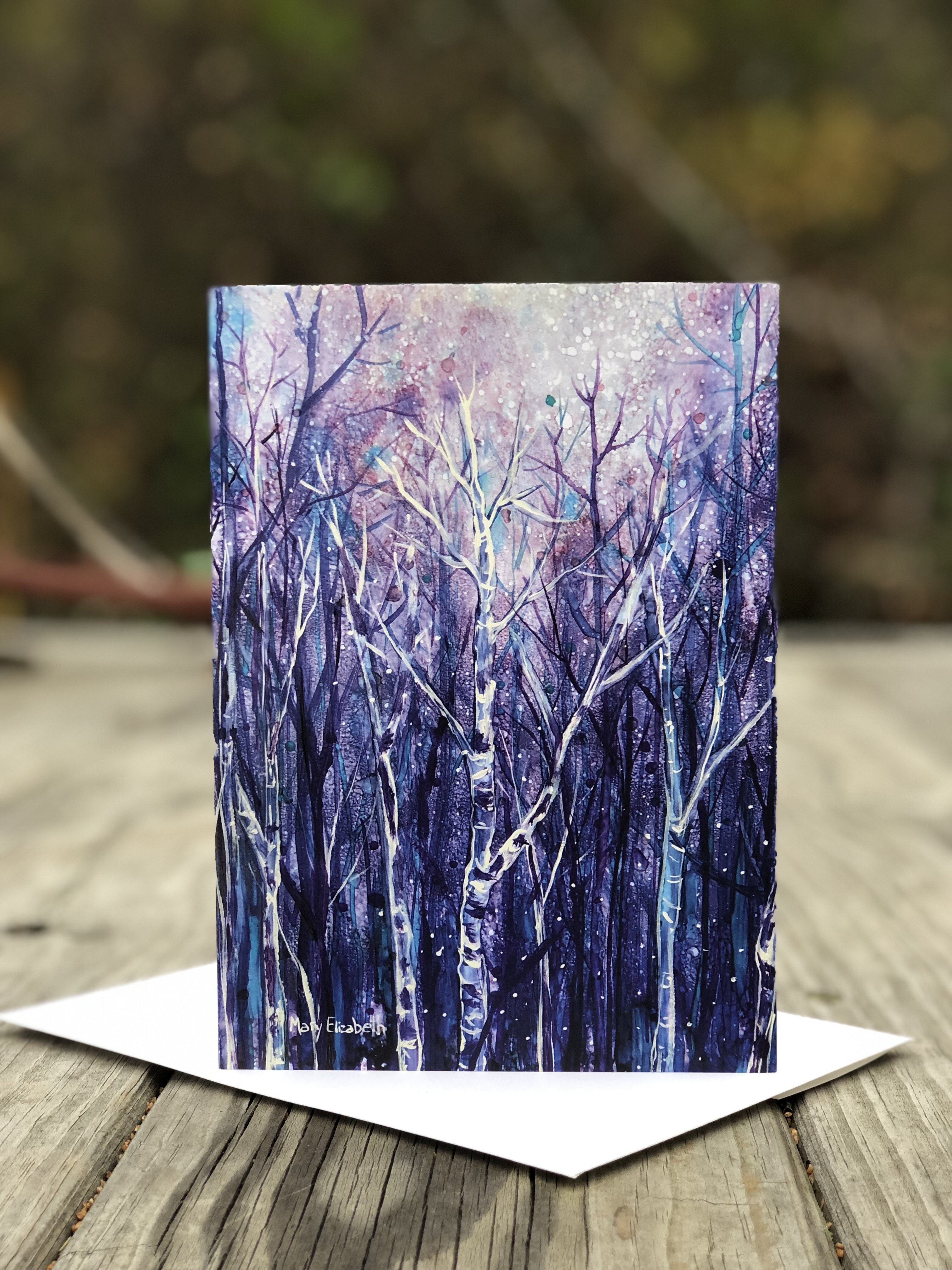 A beautifully illustrated greeting card featuring a magical spring forest landscape, perfect for any occasion.