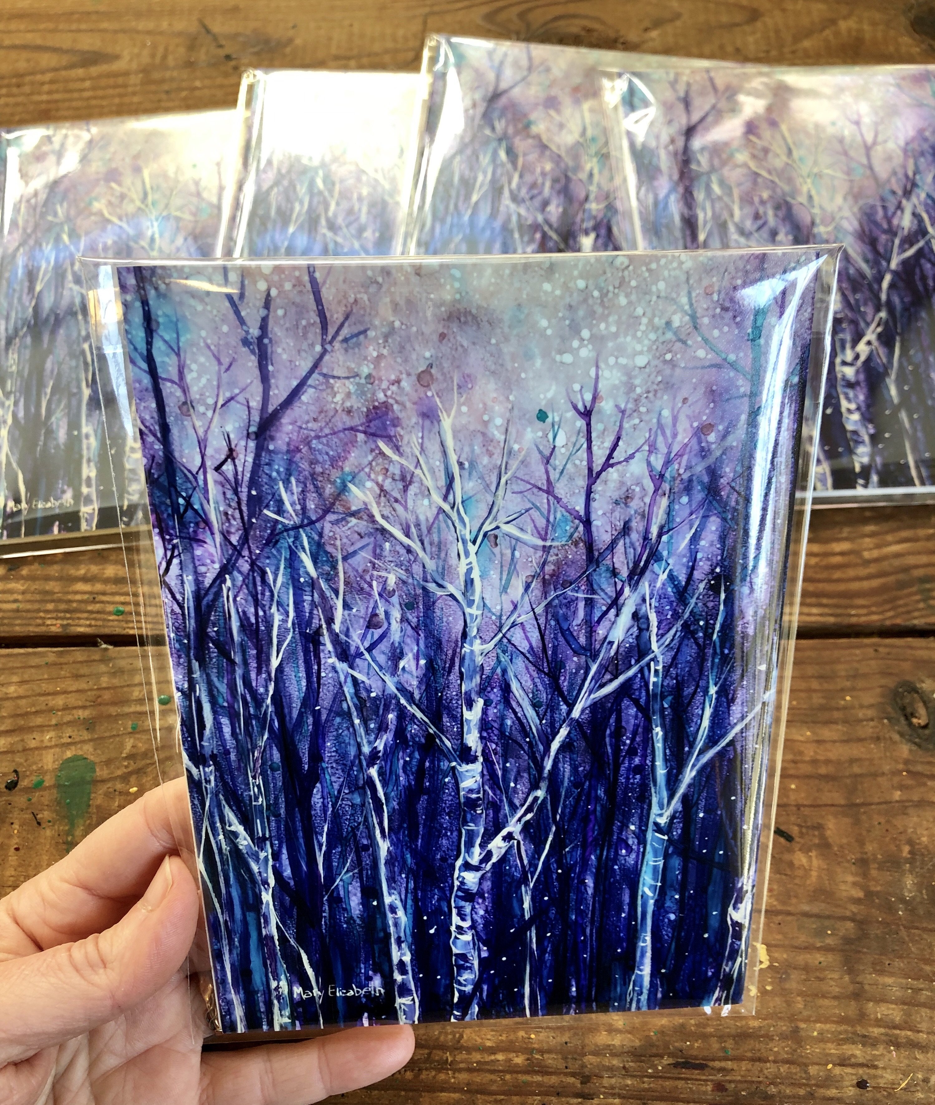 A glossy print of a magical spring forest landscape, featuring vibrant colors and intricate details that evoke a sense of wonder and tranquility.