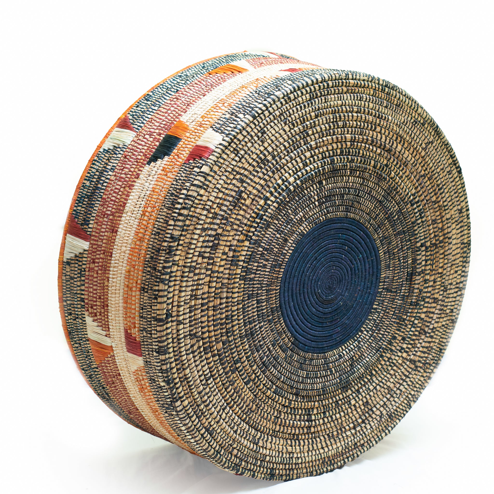 A beautifully handwoven Mahale Multi-Purpose Basket showcasing authentic African design with vibrant colors and unique striped patterns, perfect for home decor.