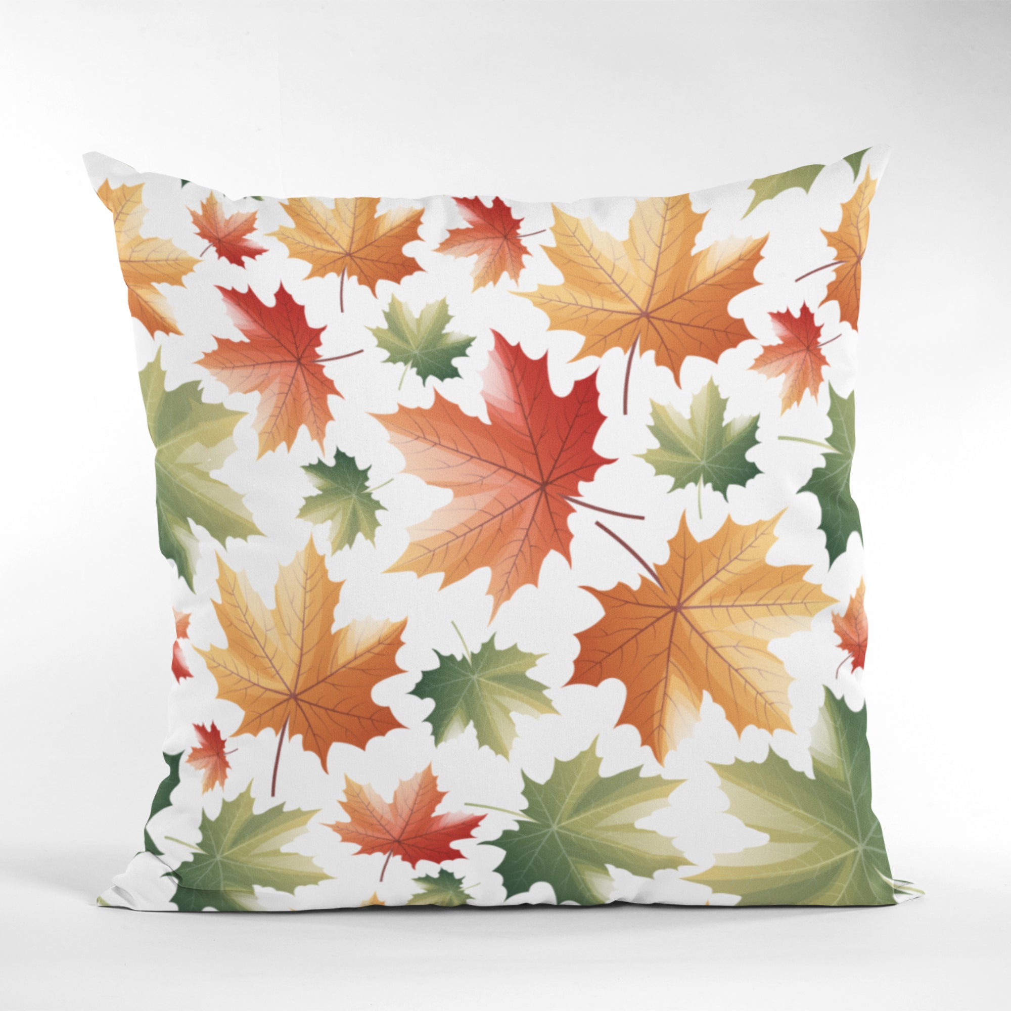 Maple Leaf Pattern Throw Pillow by Homeezone featuring vibrant maple leaf design on one side and light cream back.