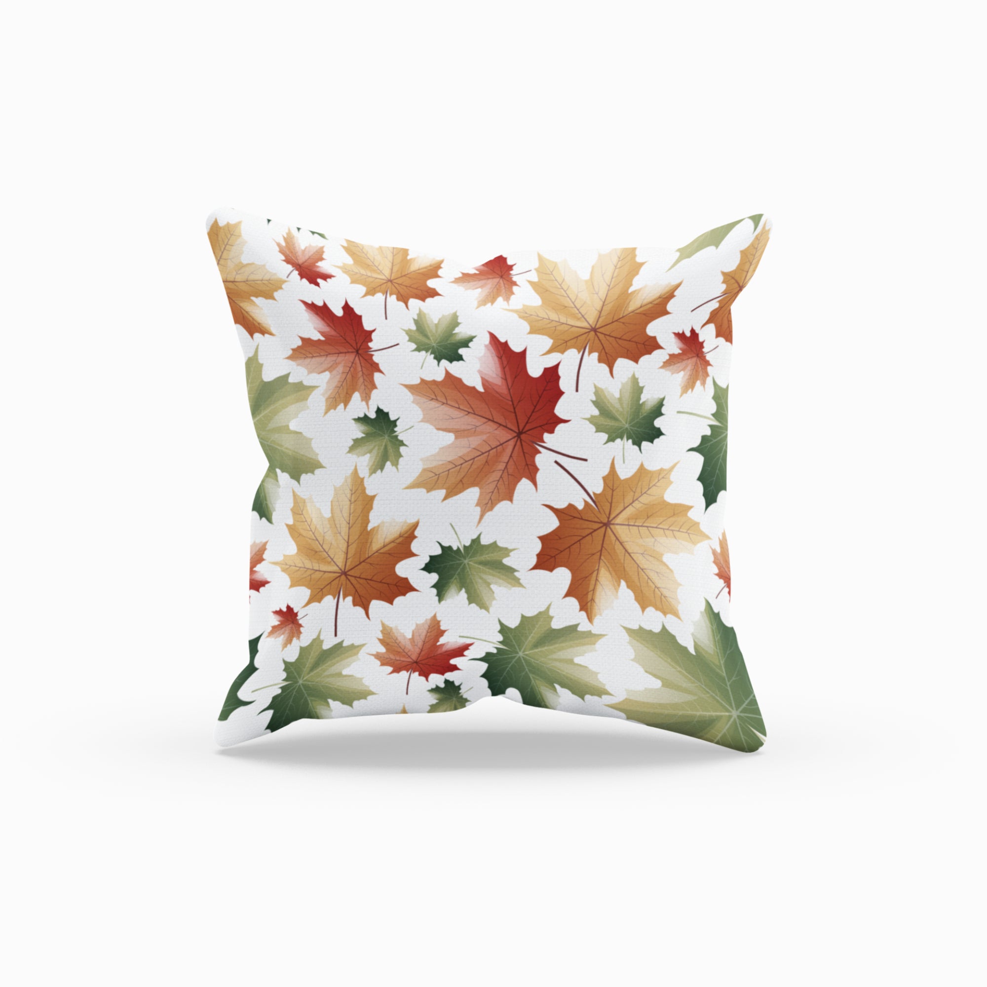 Maple Leaf Pattern Throw Pillow by Homeezone featuring vibrant maple leaf design on one side and light cream back.