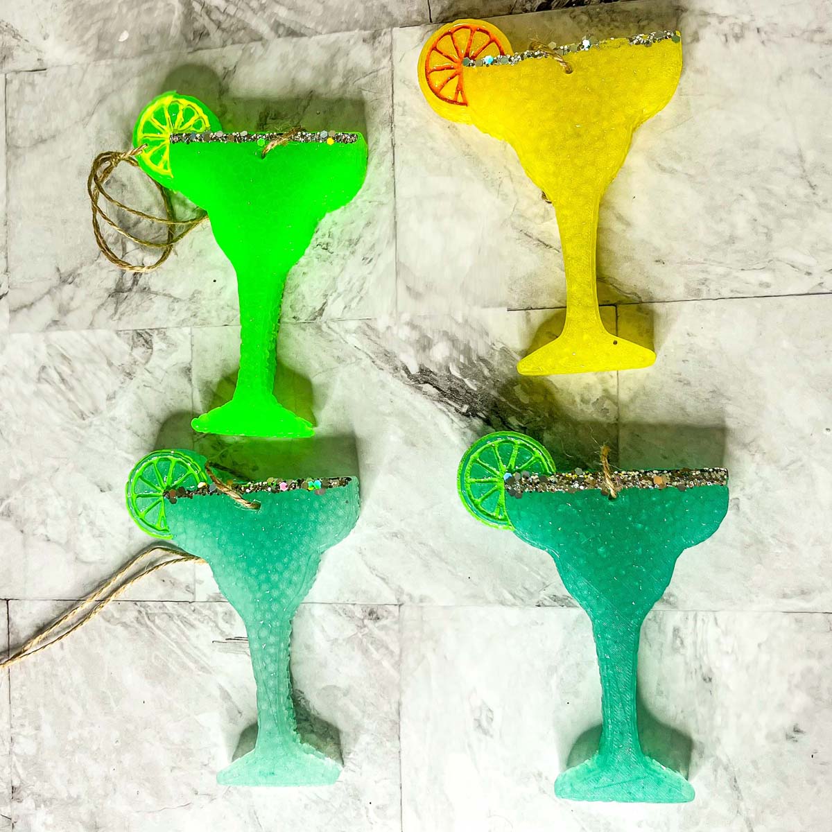 Margarita Freshie car air freshener in vibrant colors, shaped like a margarita glass, adding a festive touch to any vehicle.