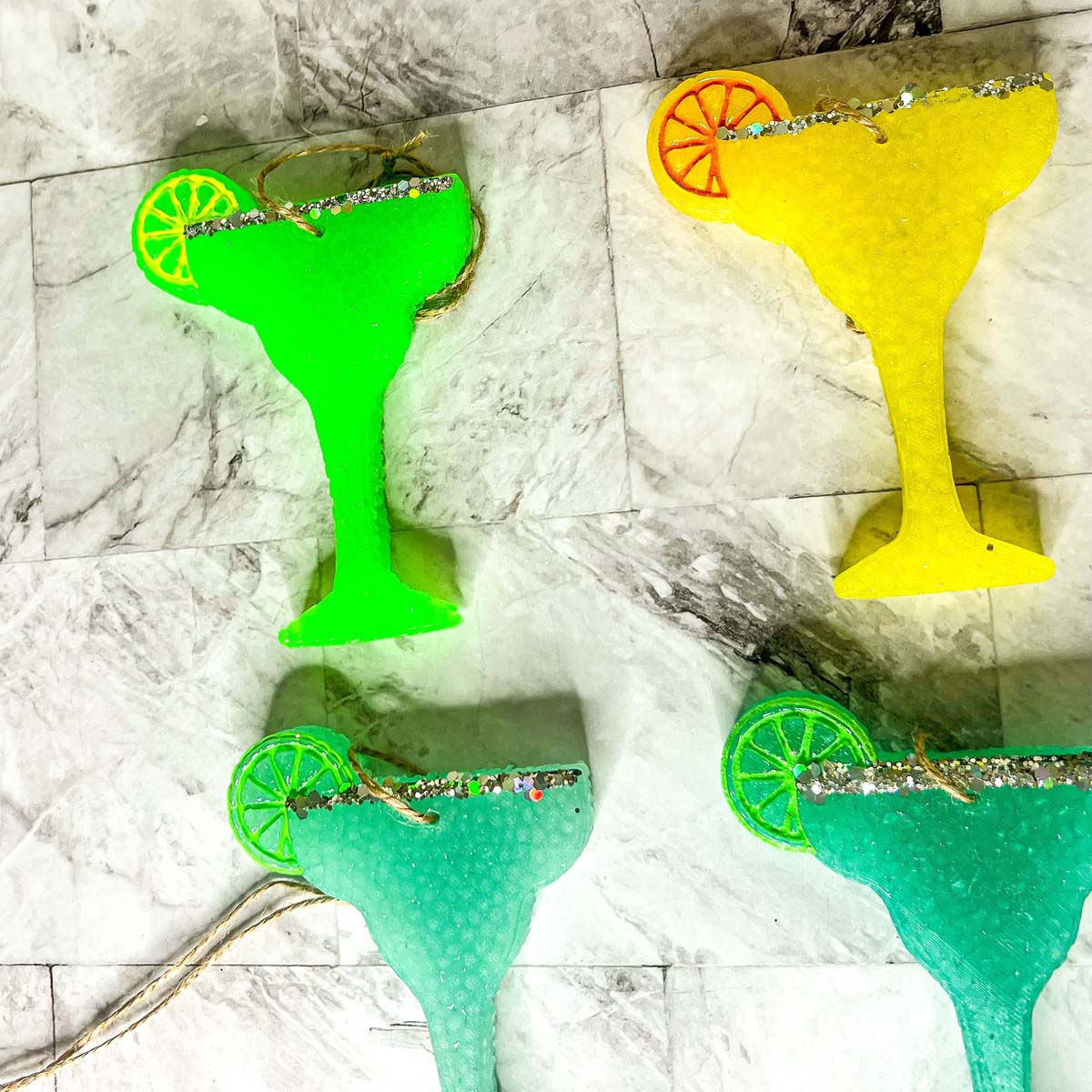 Margarita Freshie car air freshener in vibrant colors, shaped like a margarita glass, adding a festive touch to any vehicle.