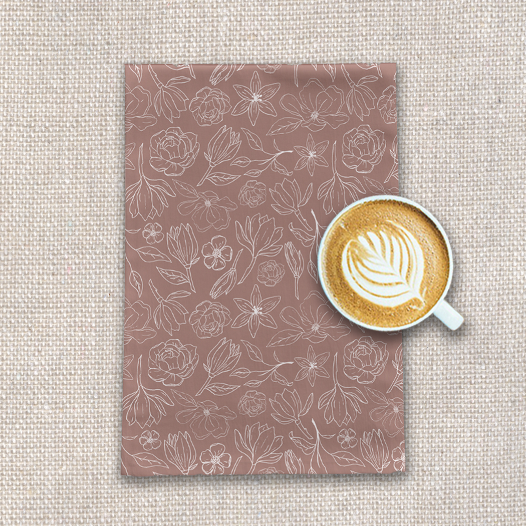 Mauve Magnolia Tea Towel featuring a beautiful floral design on cotton twill fabric, perfect for kitchen use.