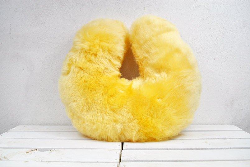 Medical Sheepskin Travel Pillow in a soft, natural sheep fur design, ideal for neck support during travel.