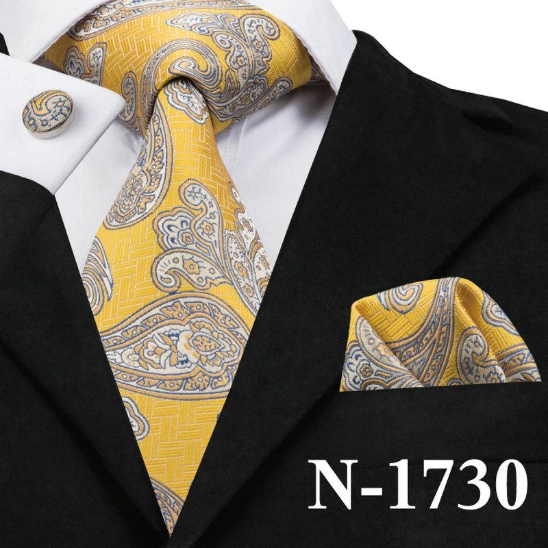 Mens 100% Silk Paisley Tie showcasing various styles and colors, perfect for formal occasions.