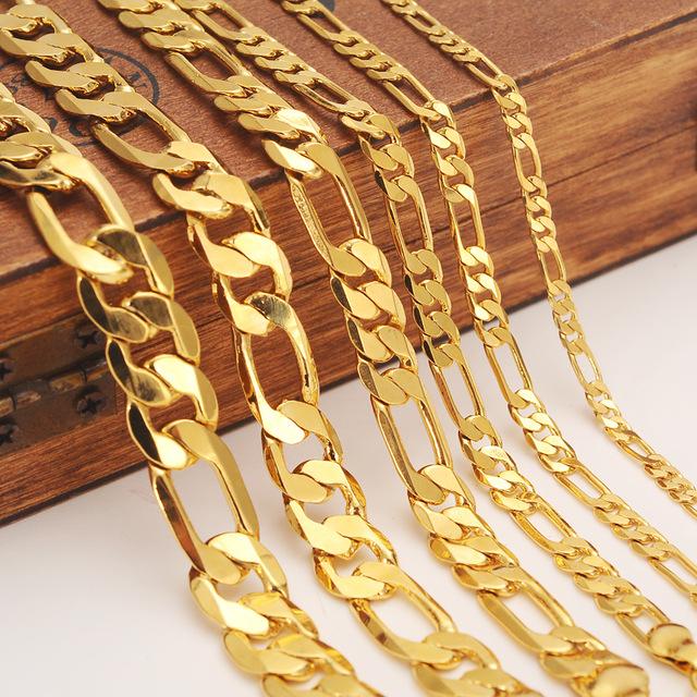 Mens and women's Solid Gold GF necklaces in various widths, showcasing elegant designs and high-quality craftsmanship.