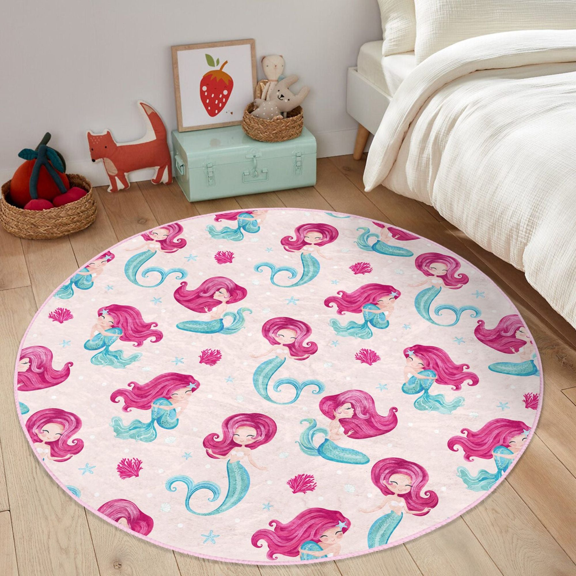 A vibrant pink washable rug featuring a whimsical mermaid design, perfect for a girl's bedroom, made from soft and durable materials.