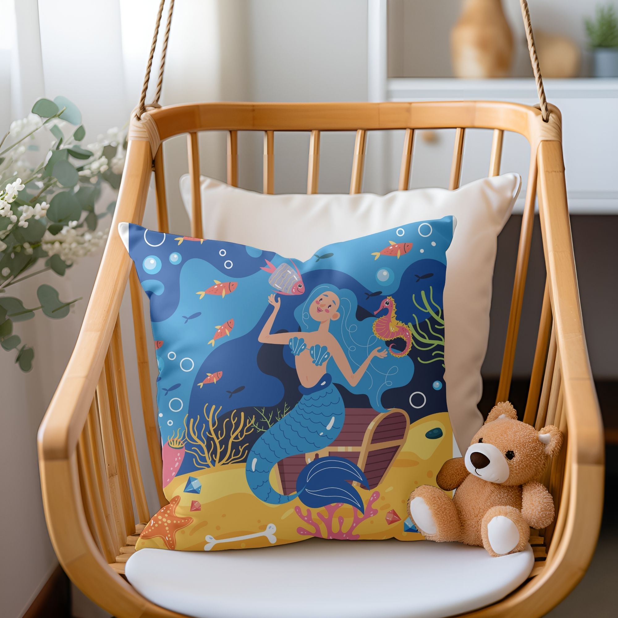 A colorful pillow featuring a vibrant mermaid pattern, perfect for girls' rooms, with a light cream back.