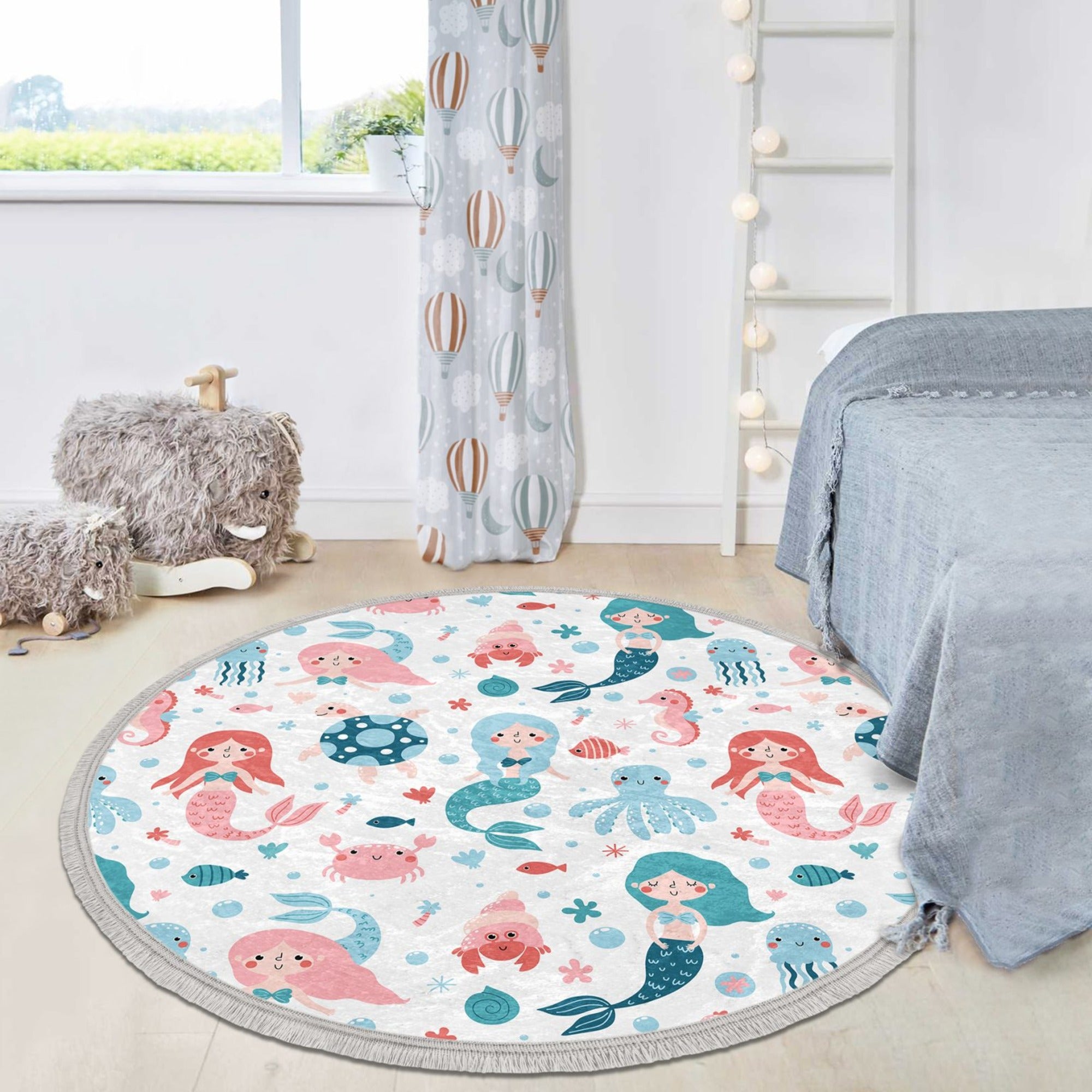 A vibrant round rug featuring a colorful mermaid design, perfect for kids' bedrooms, made of soft velvet fabric with fringes.