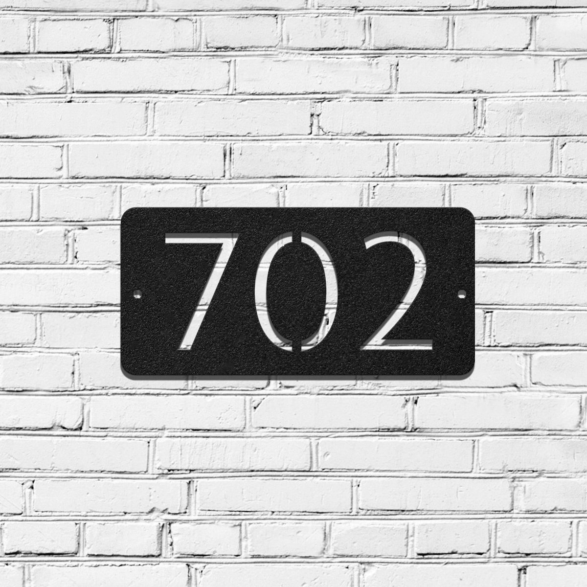 Horizontal metal house address sign with modern design, featuring pre-drilled holes for easy installation.