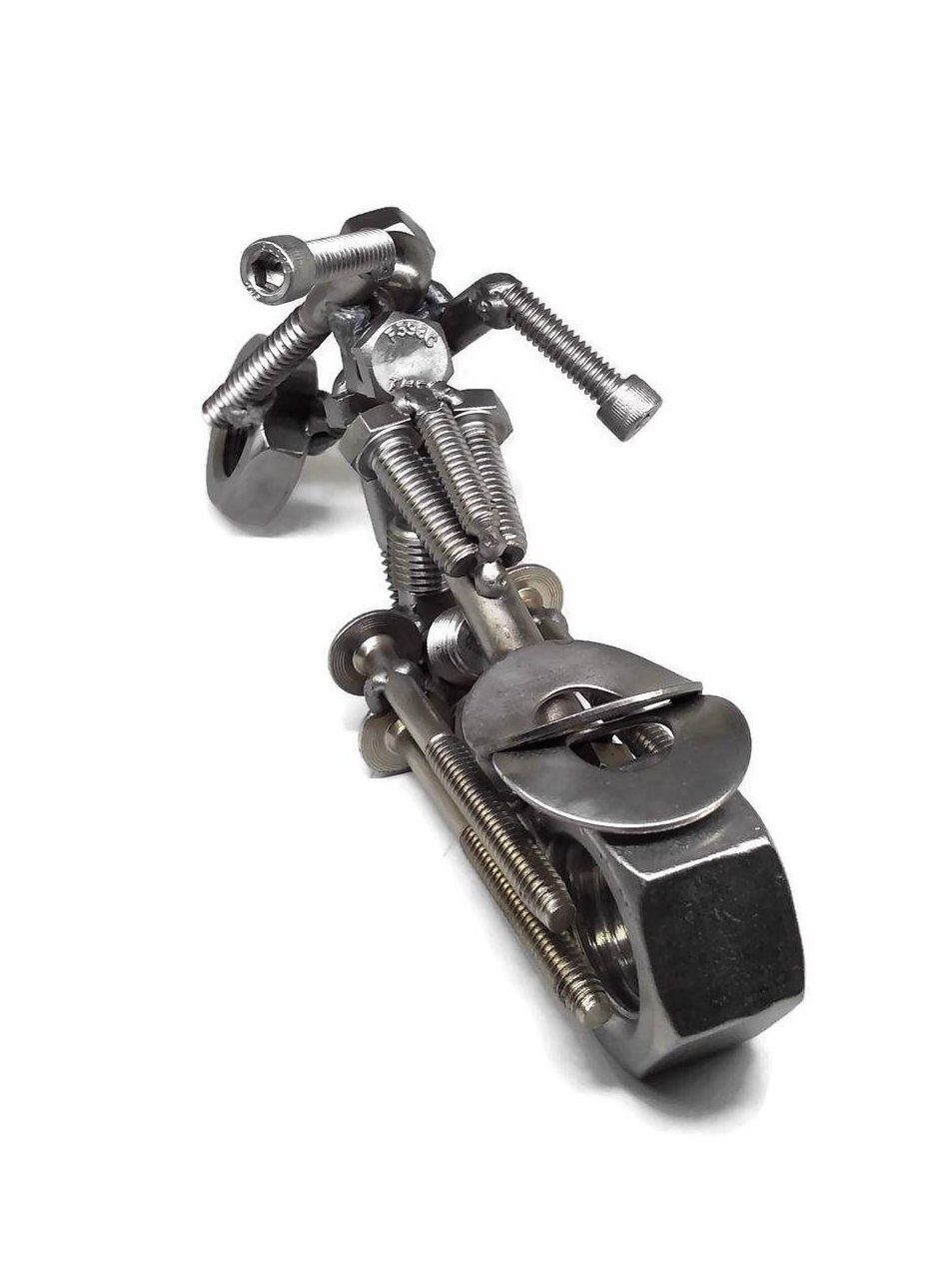 Handmade metal motorcycle figurine crafted from scrap steel, featuring intricate details of nuts, bolts, and washers, finished with a clear protective coat.