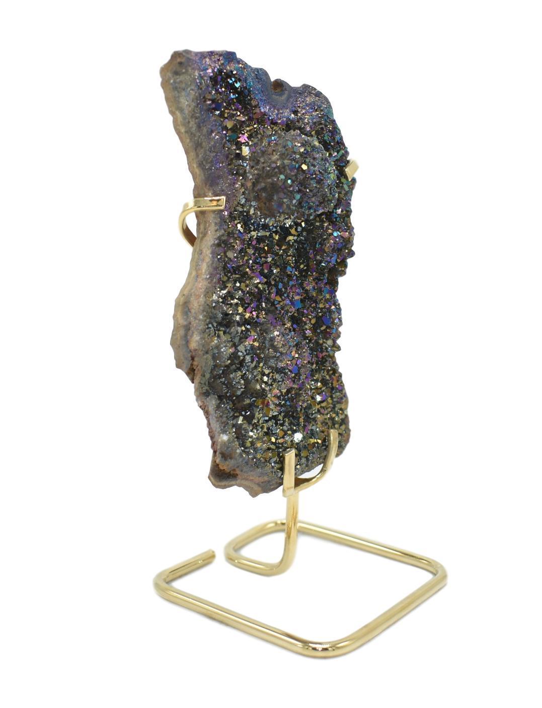 A large metalized amethyst cluster mounted on a sleek wire stand, showcasing vibrant purple hues and a shiny metallic finish.