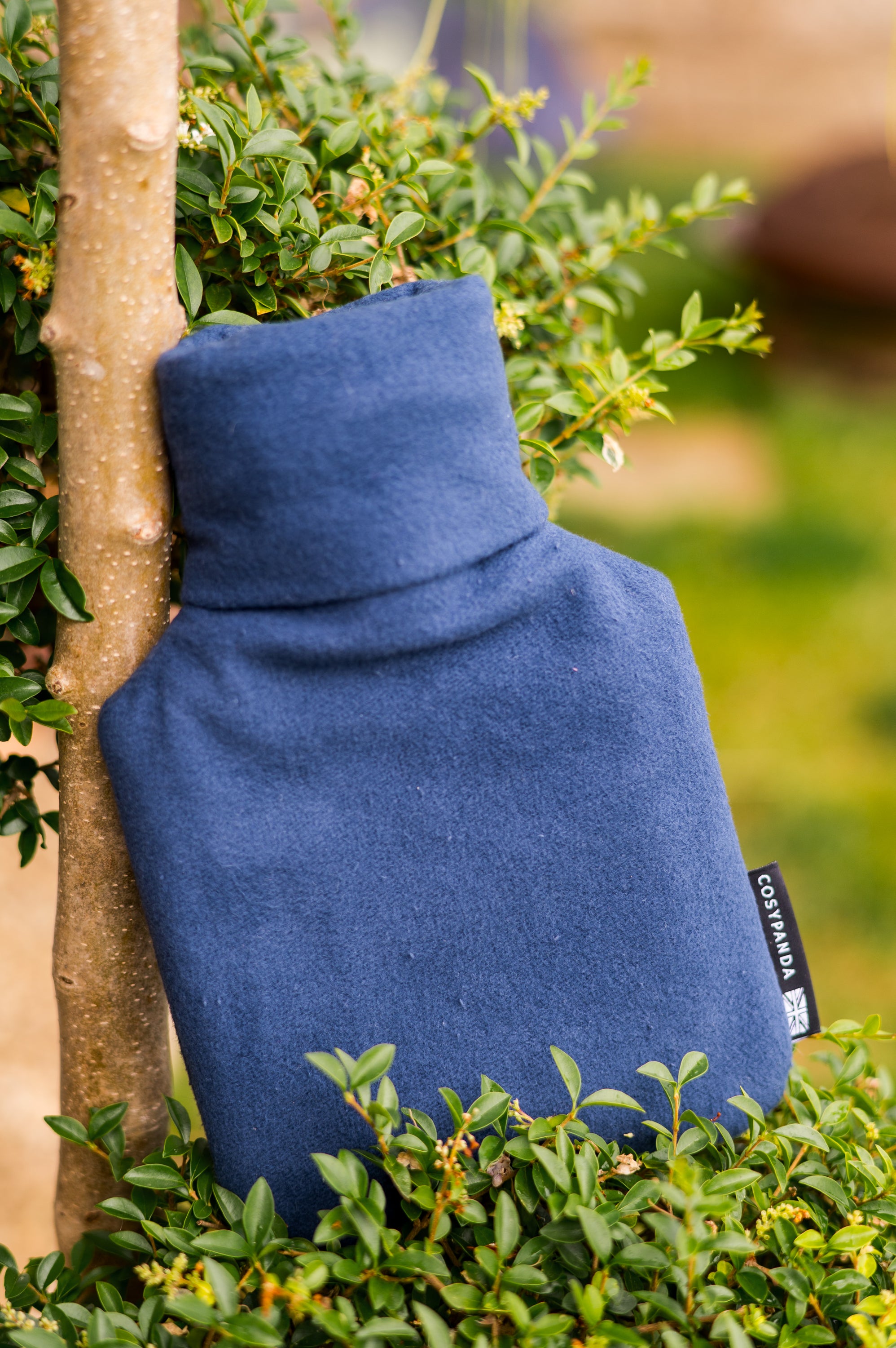 Midnight Blue Cotton 1L Hot Water Bottle with organic cotton cover and natural rubber bottle, perfect for warmth and comfort.