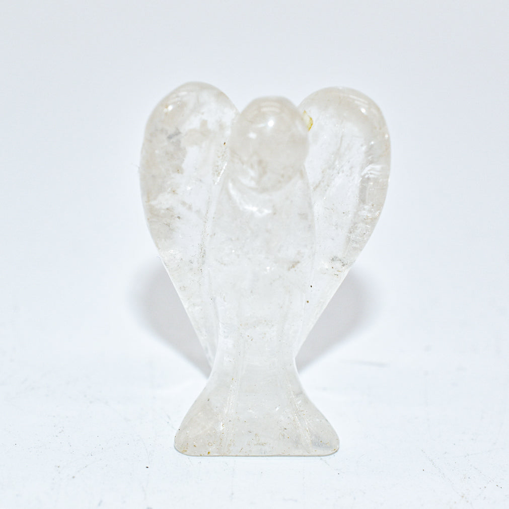 A collection of Mini Angel Carvings made from Angelite, Fluorite, Amethyst, Quartz, and Rose Quartz, showcasing their intricate details and vibrant colors.