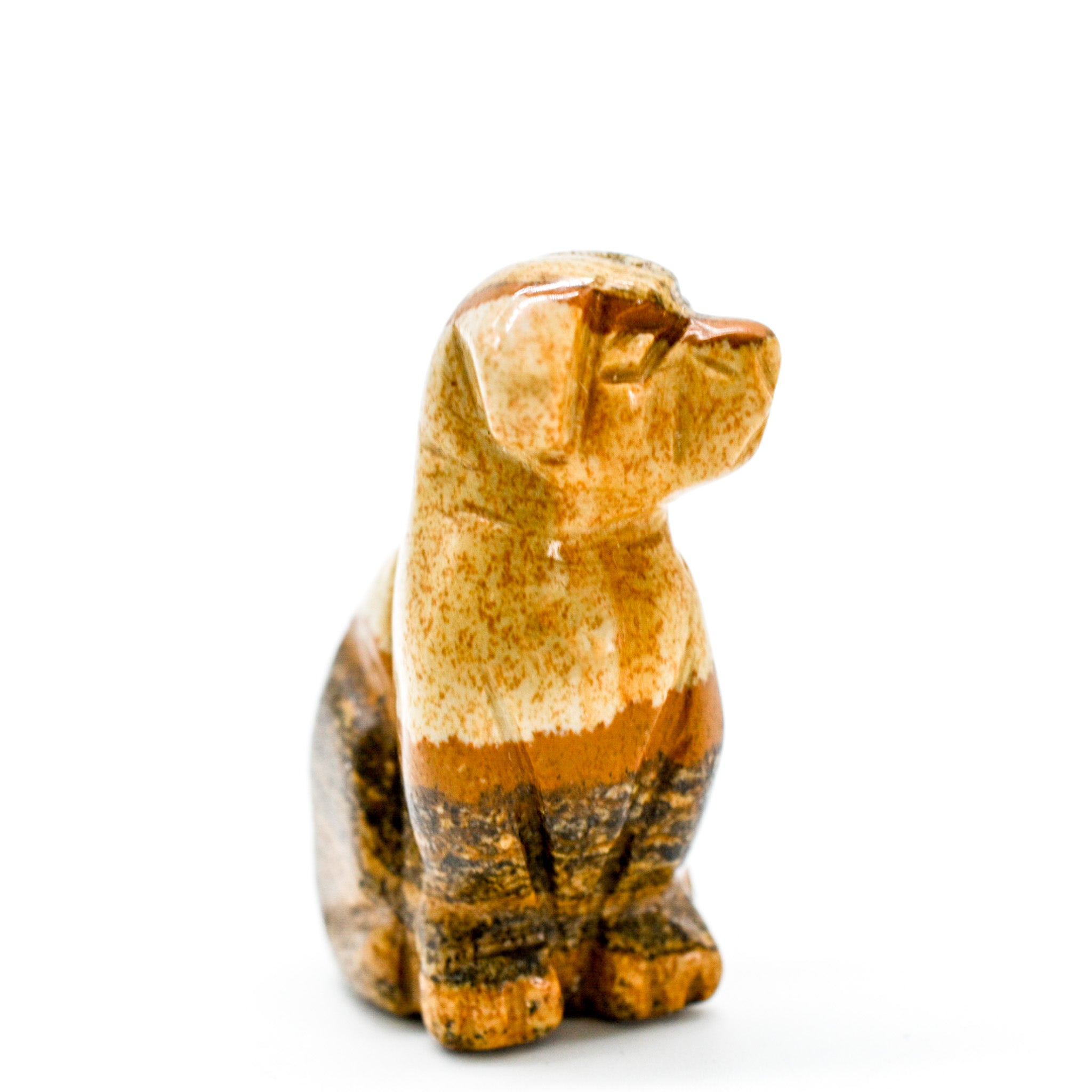 A collection of Mini Crystal Carved Dogs made from various gemstones, showcasing different breeds and sizes.