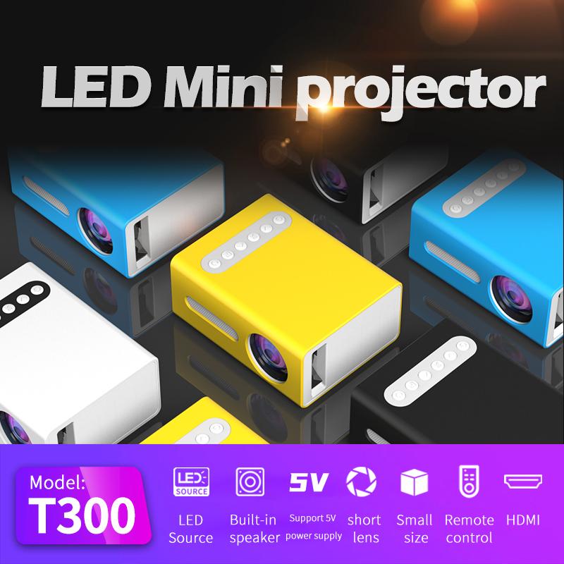 Mini Portable LCD Projector T300 with remote control and accessories, ideal for home and travel use.