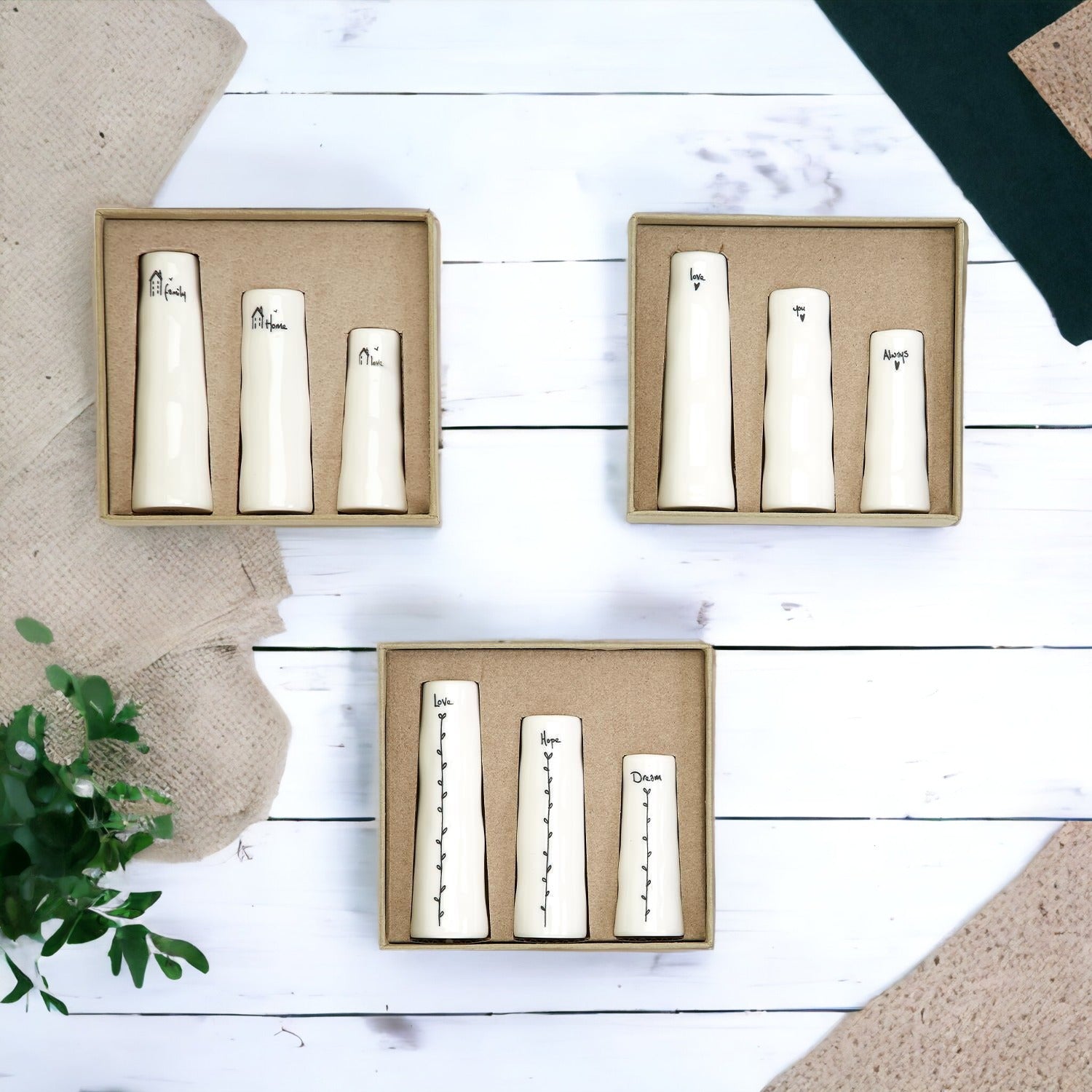 Mini Vase Gift Set featuring four unique porcelain vases in elegant designs, perfect for home decor or gifting.