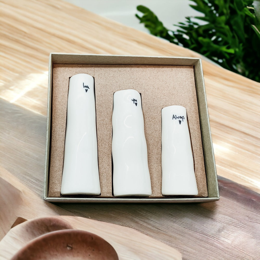 Mini Vase Gift Set featuring four unique porcelain vases in elegant designs, perfect for home decor or gifting.