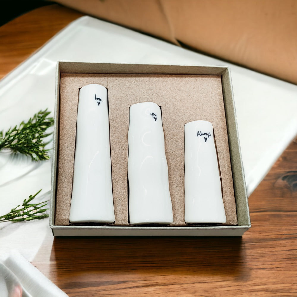 Mini Vase Gift Set featuring four unique porcelain vases in elegant designs, perfect for home decor or gifting.