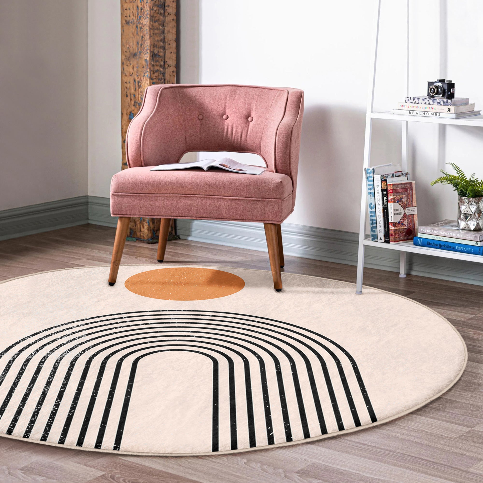 A stylish minimalist round rug in soft velvet fabric, showcasing a modern design suitable for living room decor.