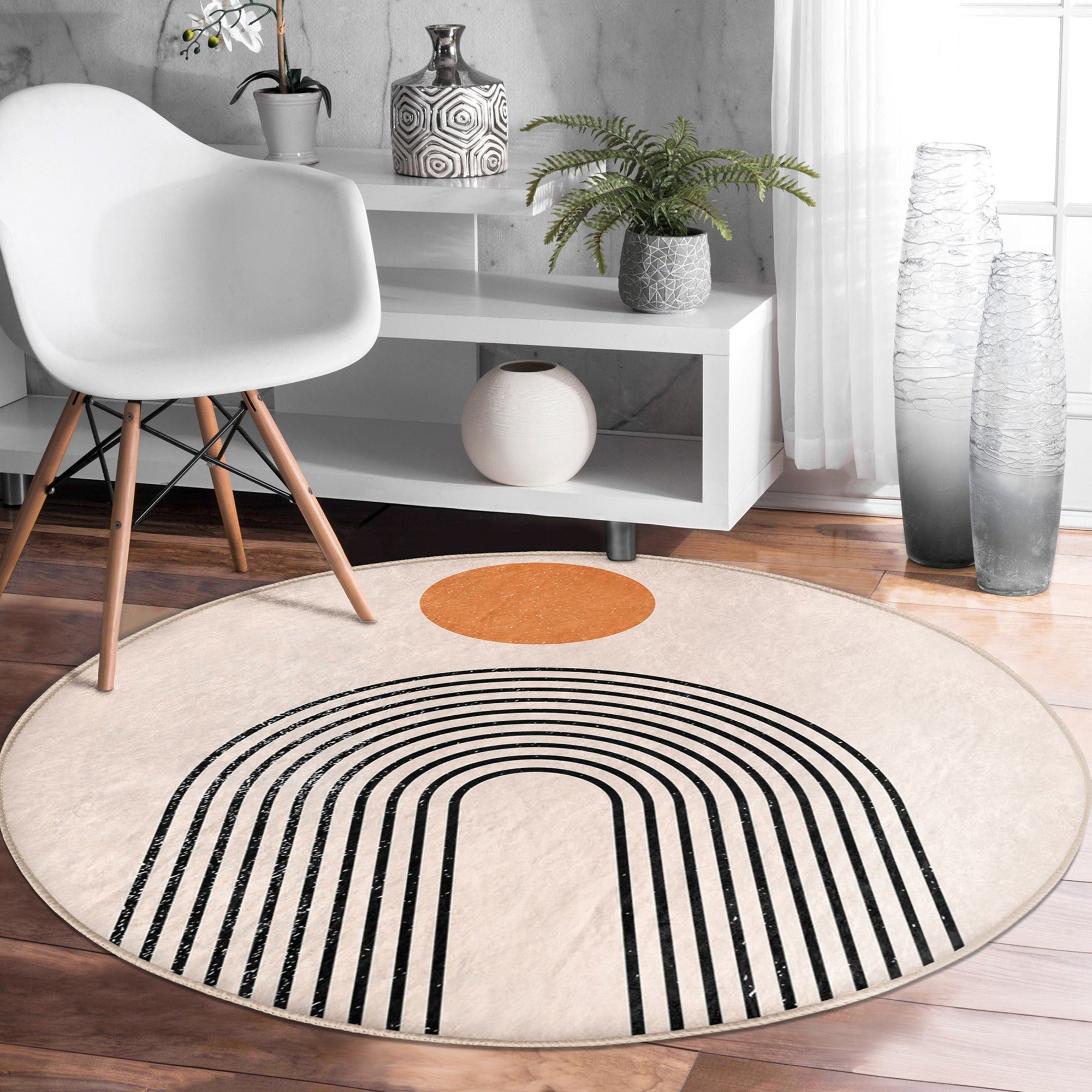 A stylish minimalist round rug in soft velvet fabric, showcasing a modern design suitable for living room decor.