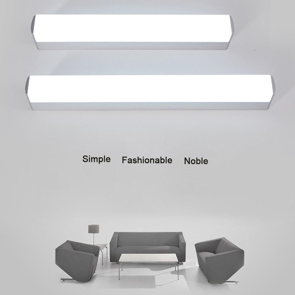 Modern LED Mirror Light in stainless steel, waterproof design, wall-mounted fixture for bathroom lighting.