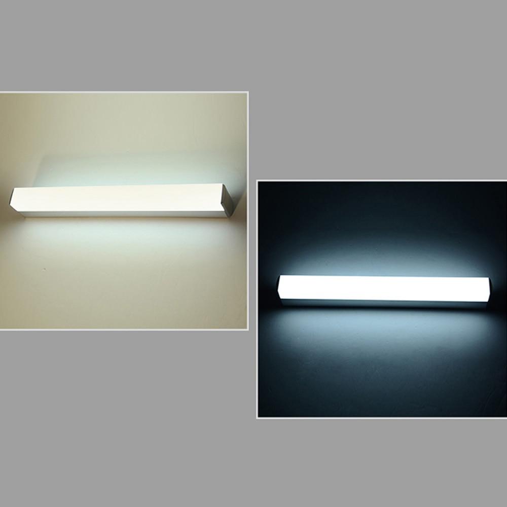 Modern LED Mirror Light in stainless steel, waterproof design, wall-mounted fixture for bathroom lighting.