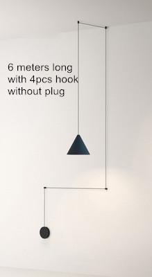 Modern pendant light featuring a black metal cone shape with a long wire, ideal for stylish home and commercial decor.