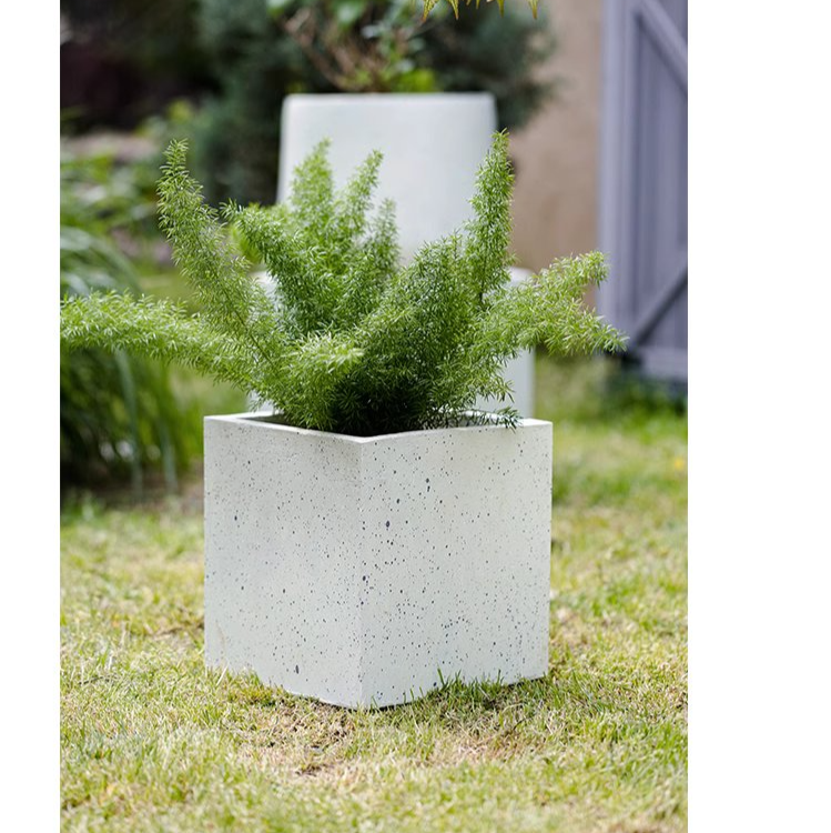 Modern White Square Planter made of magnesium oxide, featuring a sleek design and drainage hole, perfect for indoor and outdoor plants.