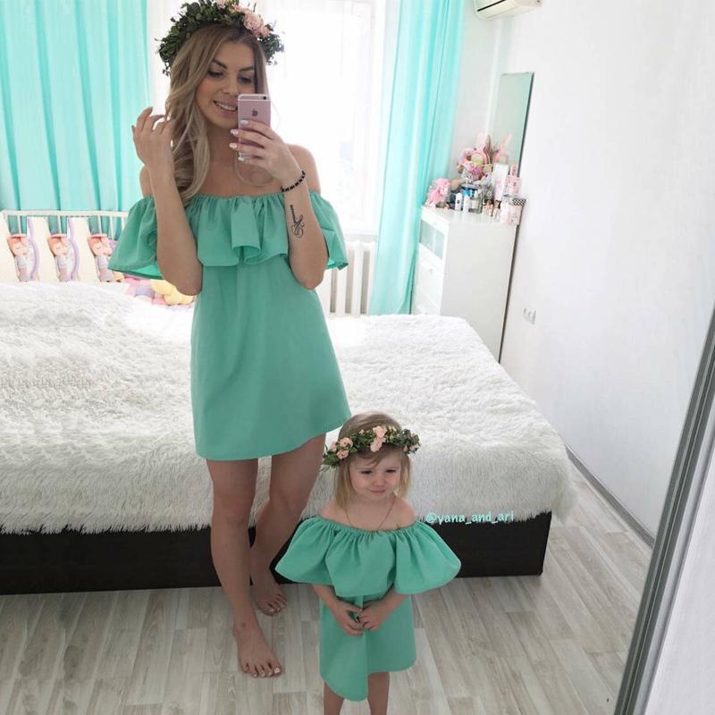 Mom and Daughter Dress showcasing matching outfits in casual sleeveless style, perfect for family occasions.