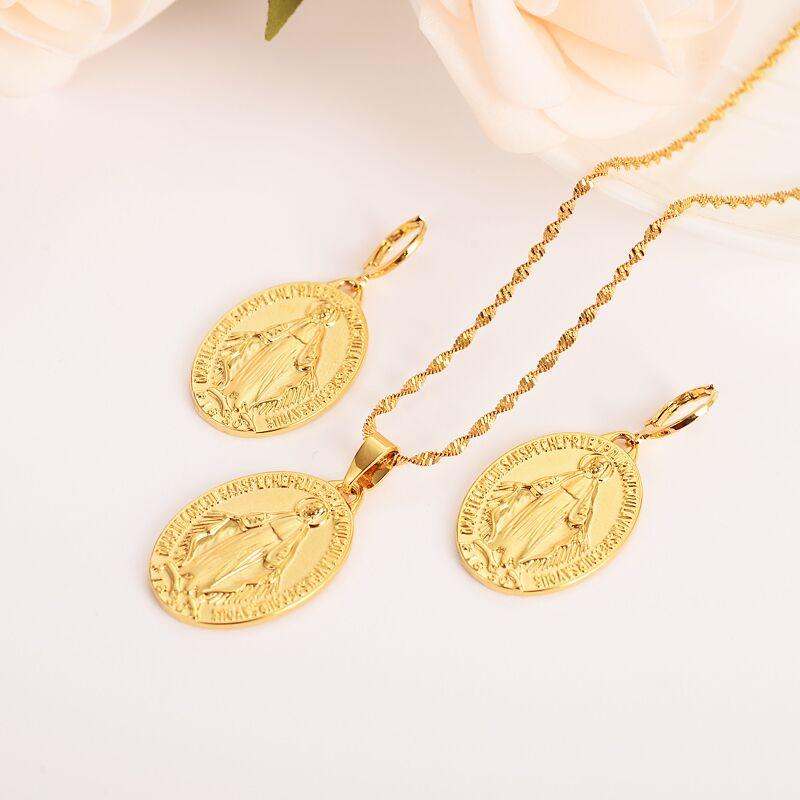 Mother Virgin Mary Necklace Earrings Set in fine solid gold finish, showcasing intricate design and craftsmanship.