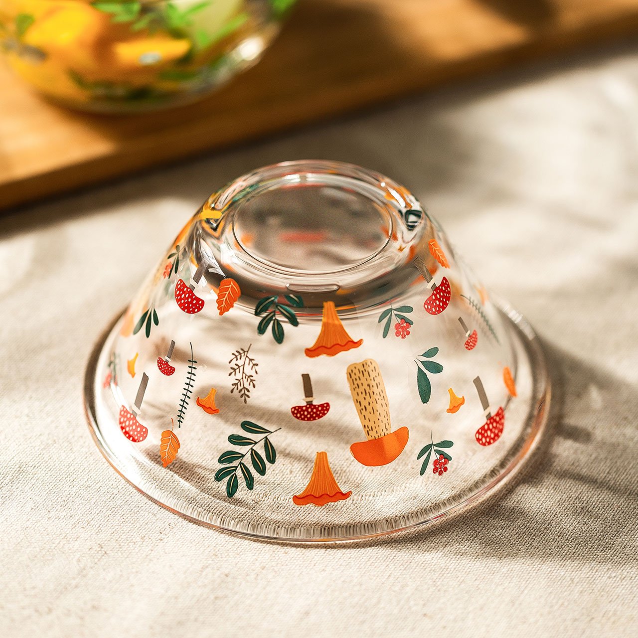 A beautifully handpainted Mushroom Glass Bowl featuring floral designs, perfect for serving and decoration.