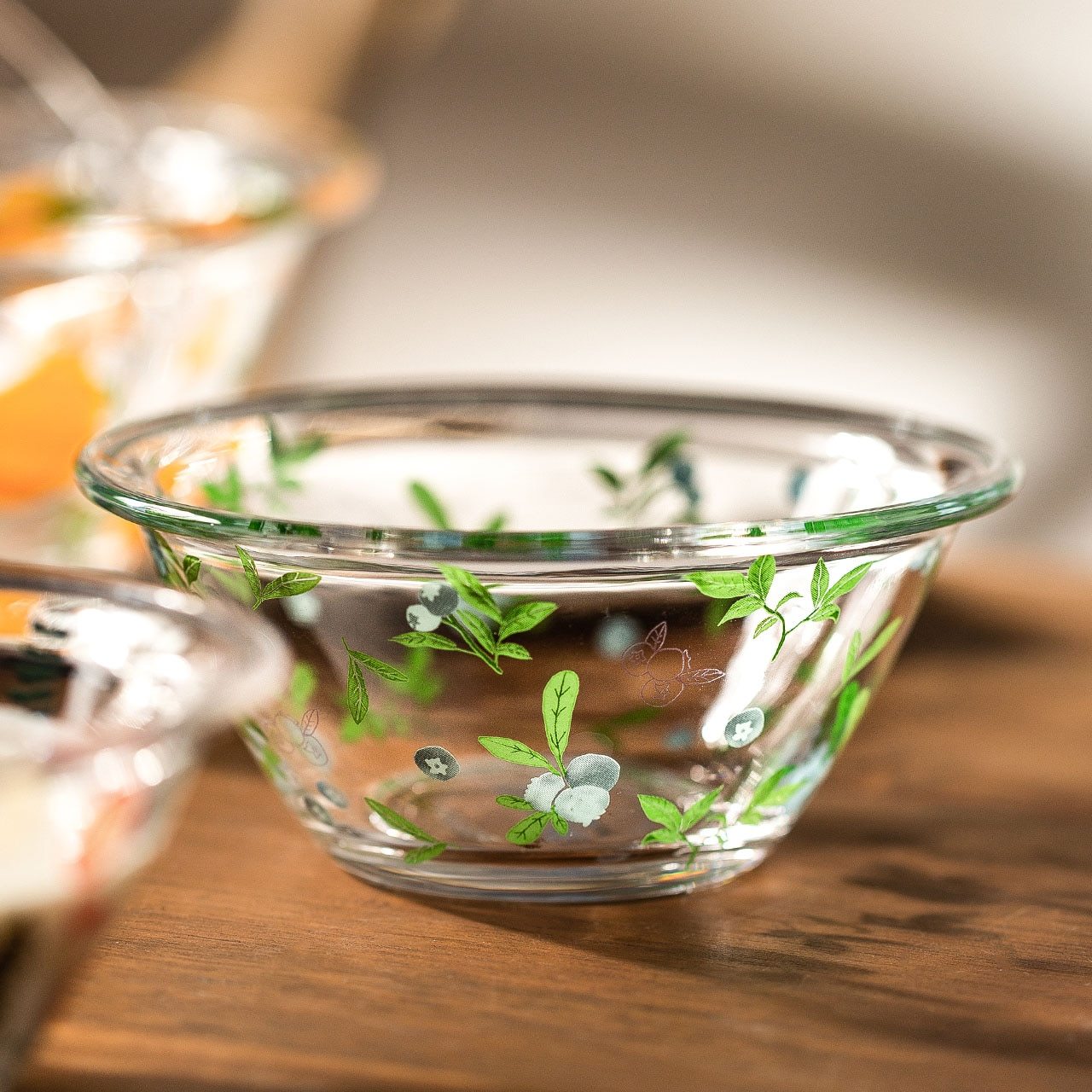 A beautifully handpainted Mushroom Glass Bowl featuring floral designs, perfect for serving and decoration.