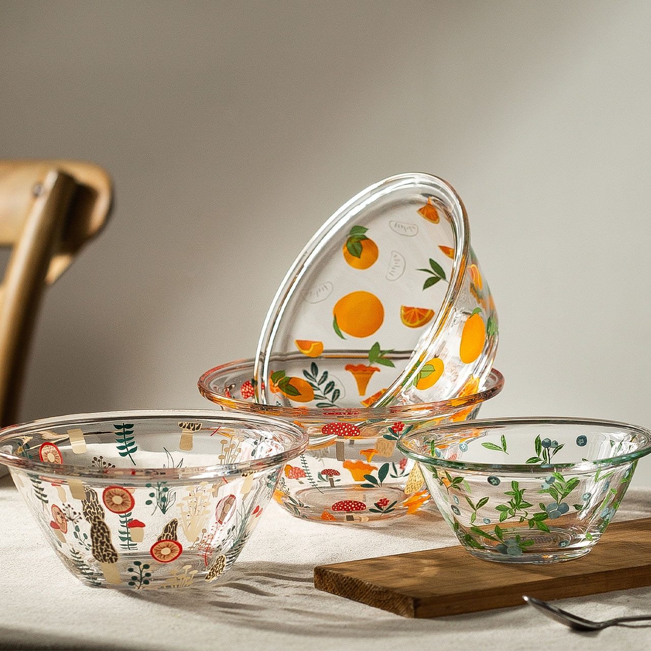 A beautifully handpainted Mushroom Glass Bowl featuring floral designs, perfect for serving and decoration.