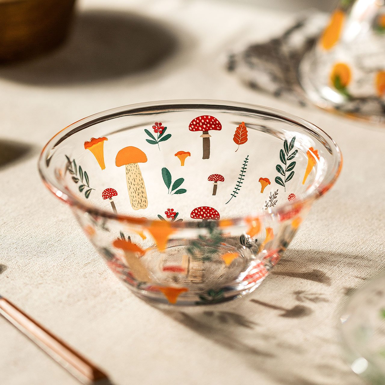 A beautifully handpainted Mushroom Glass Bowl featuring floral designs, perfect for serving and decoration.