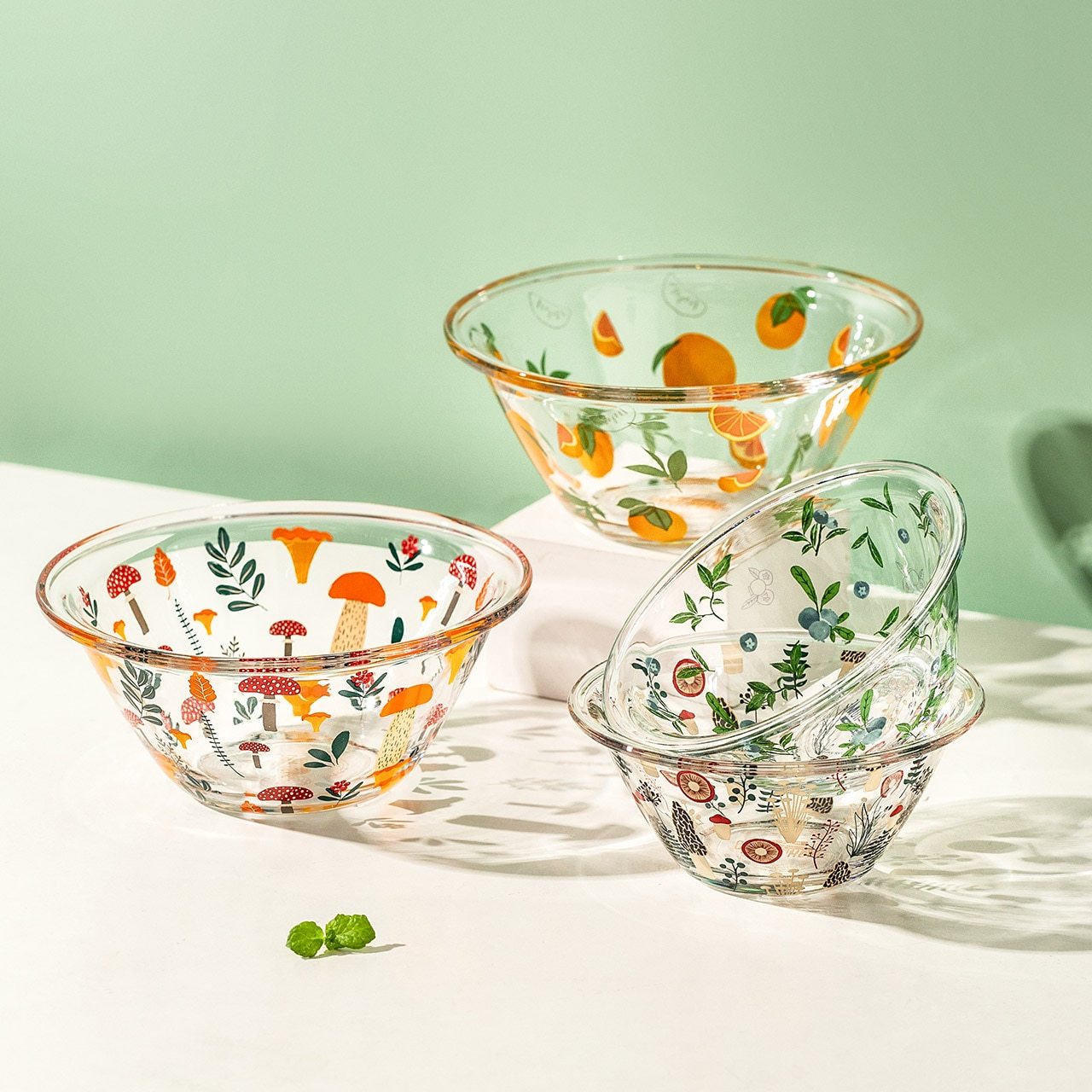 A beautifully handpainted Mushroom Glass Bowl featuring floral designs, perfect for serving and decoration.