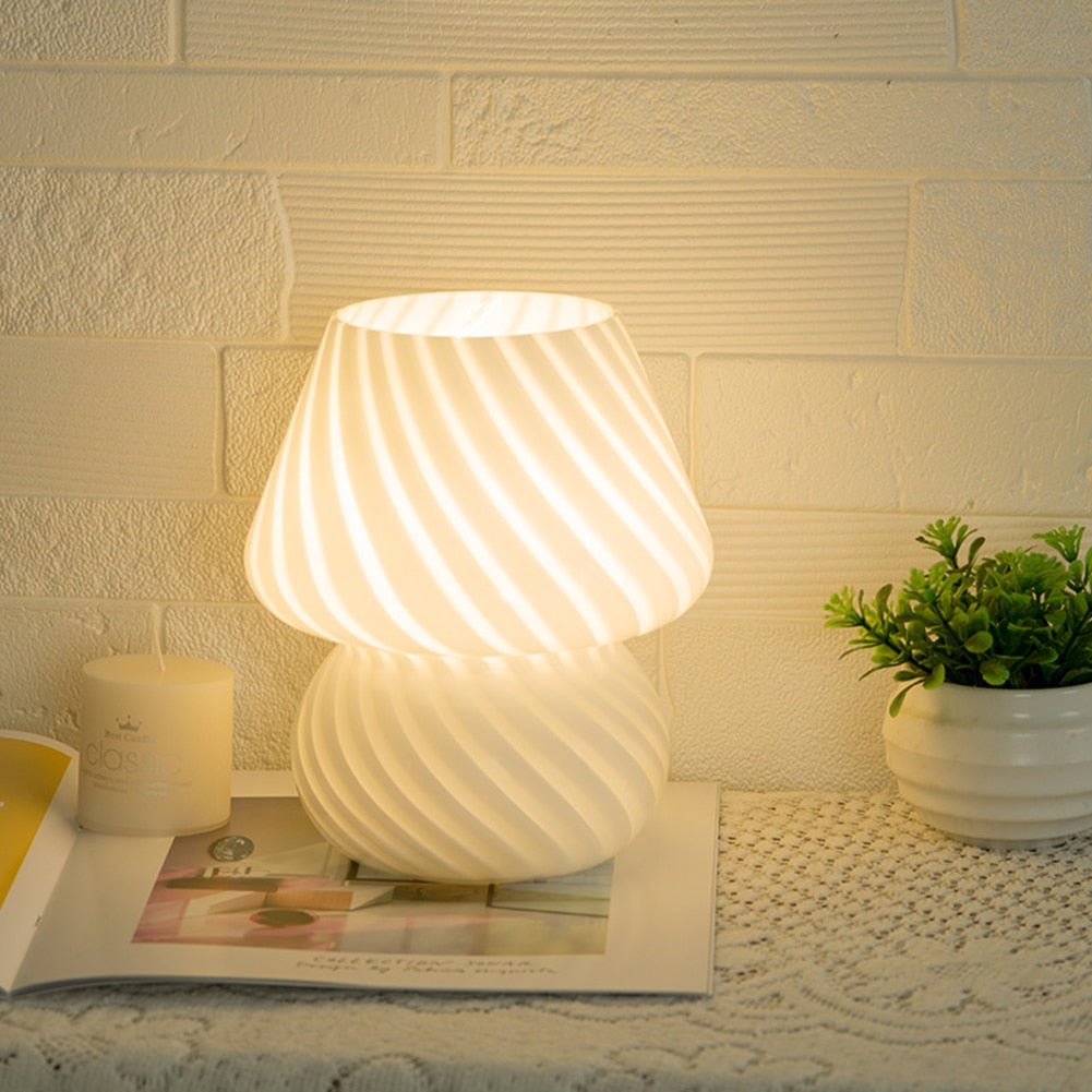 A stylish Mushroom Table Lamp with a dimmable feature, showcasing its elegant design and compact size.