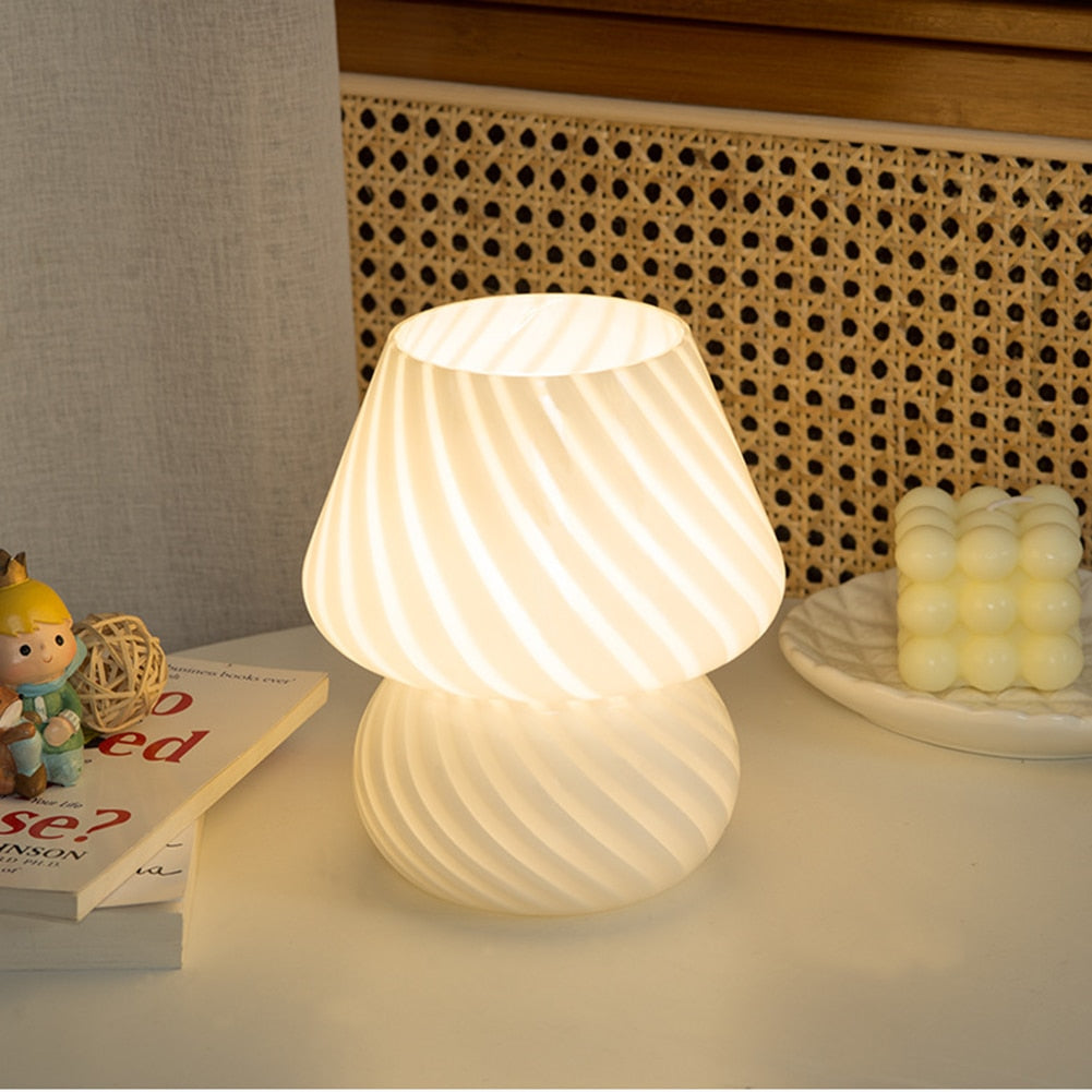 A stylish Mushroom Table Lamp with a dimmable feature, showcasing its elegant design and compact size.