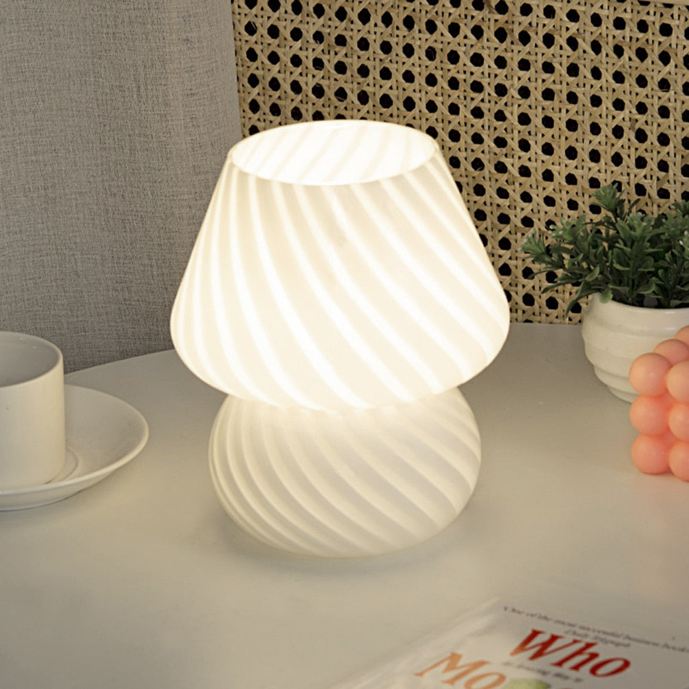 A stylish Mushroom Table Lamp with a dimmable feature, showcasing its elegant design and compact size.