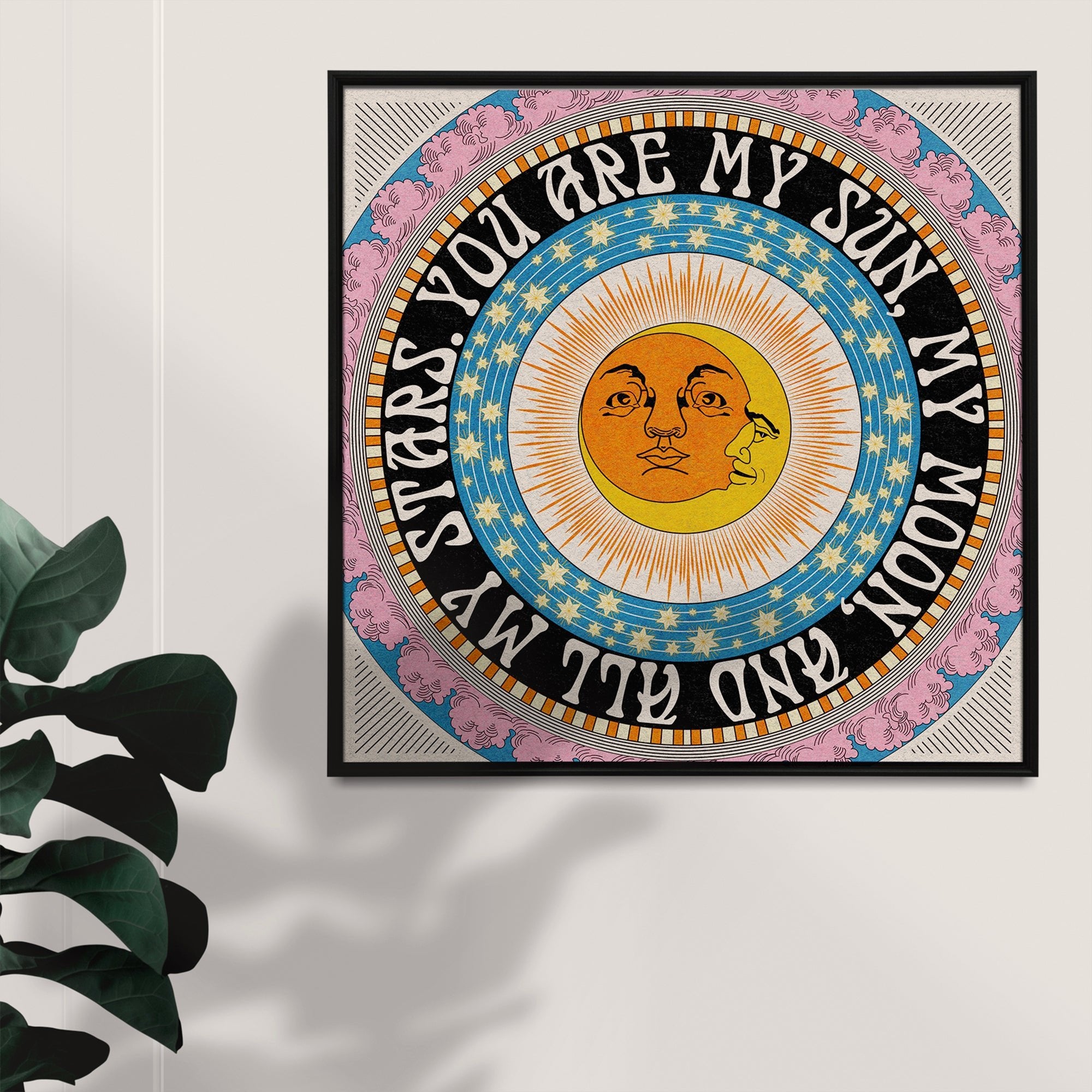 A celestial square art print featuring an intertwined sun and moon illustration surrounded by stars and clouds with a heartfelt quote.