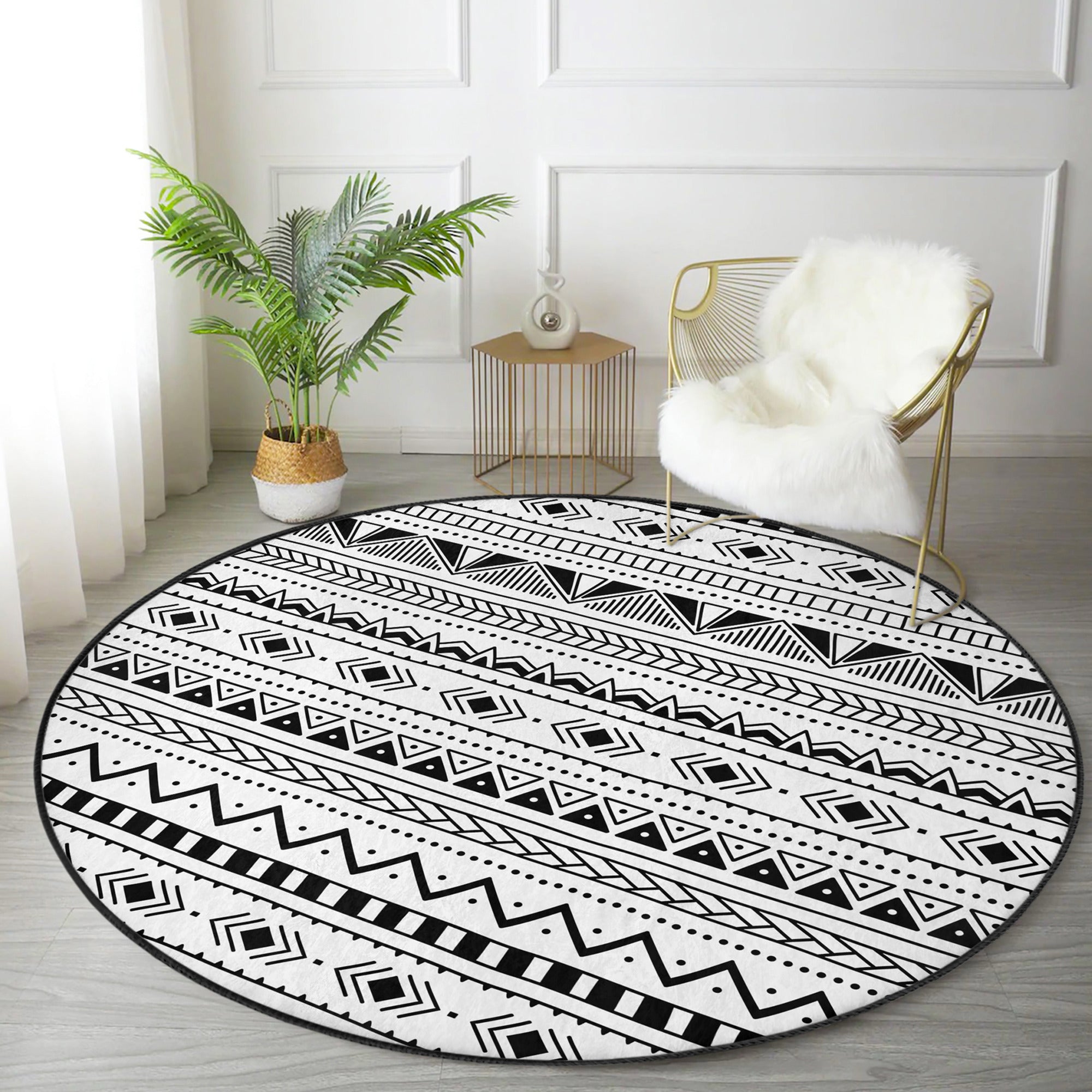 Native Round Rug in black and white, showcasing its soft velvet texture and round shape, perfect for home decor.